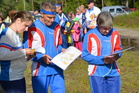 Aktiiviset Heikkilät: Anneli, Markku ja Heli.